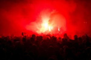 football fans lit up the lights and smoke bombs. revolution. protest